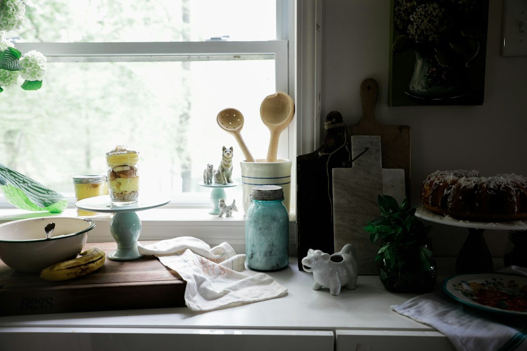 white ceramic vase on white table cloth